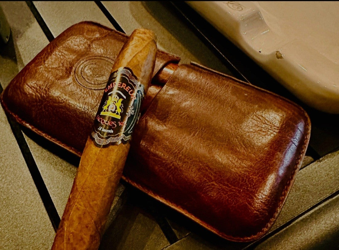Empereur Jacques 1er cigar resting on a brown leather cigar case, Hispaniola Cigars Distributor