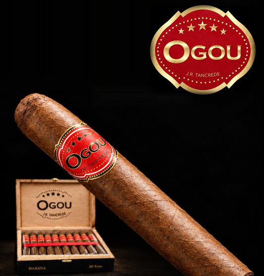 Ogou Cigars by JR Tancrede, open box of 20 Toro with an Ogou cigar in front, Hispaniola Cigars Distributor